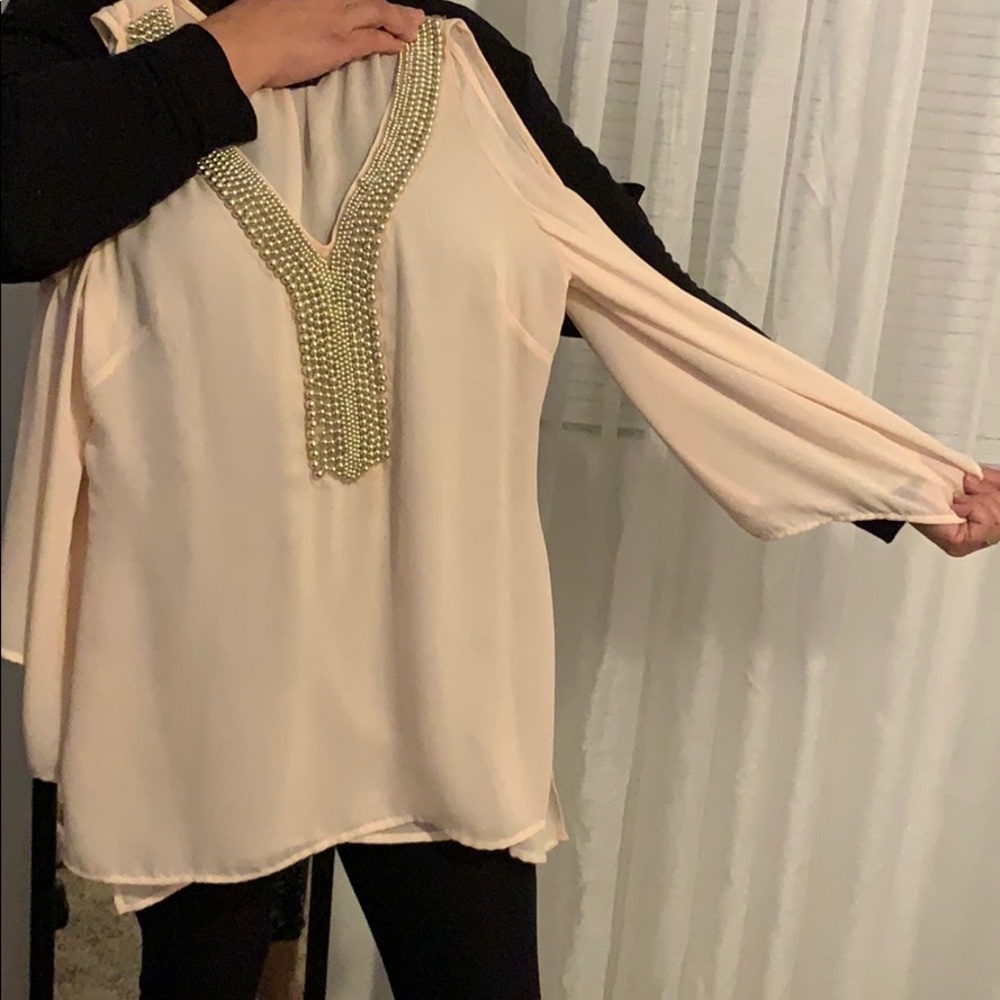 Light creamy peach blouse